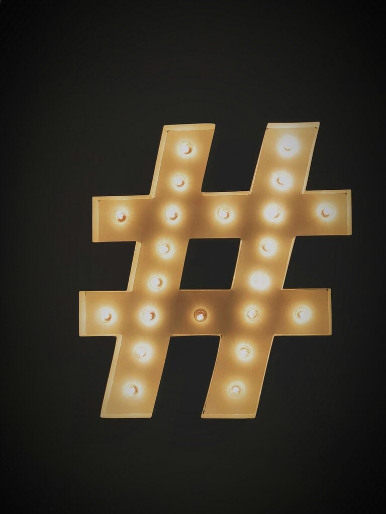 A lit-up hashtag sign